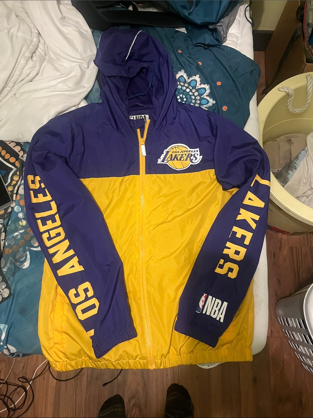 LA Lakers purple and gold warm up jacket .
